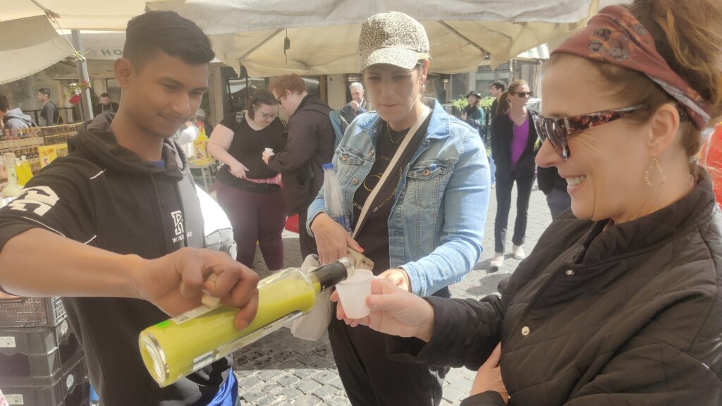food tour guests sample limoncello at Campo de' Fiori