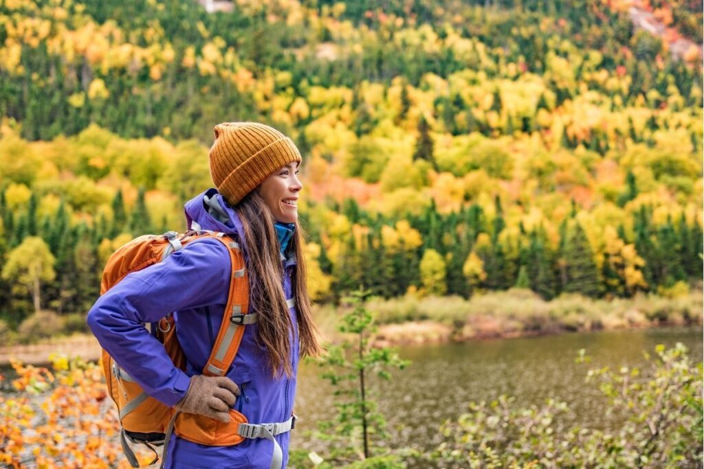 woman hiking in fall