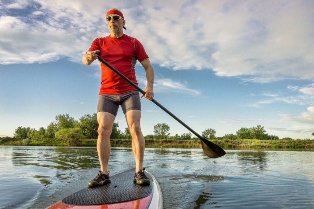 5 Active Holidays Over 50 You'll Love! 5 paddleboarding over 50 | Enjoy Travel Life