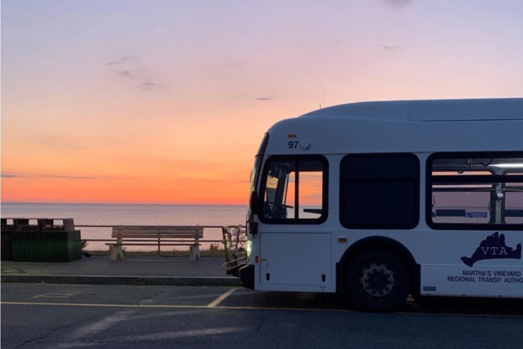 Martha's Vineyard VTA bus parked near the beach at sunset