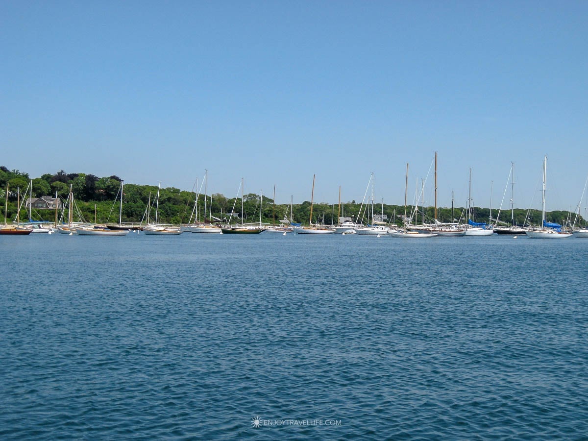 Where to stay on Martha's Vineyard - sailboats moored in a harbor on a calm summer afternoon