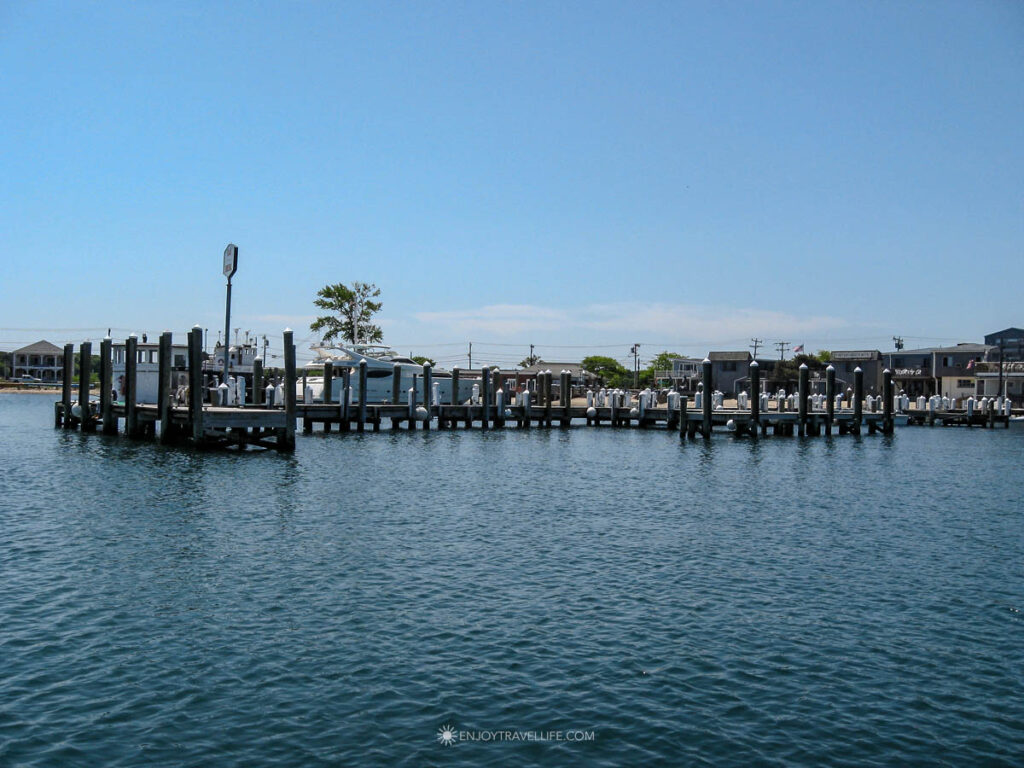 Vineyard Haven marina dock with boats and waterfront buildings on Martha's Vineyard