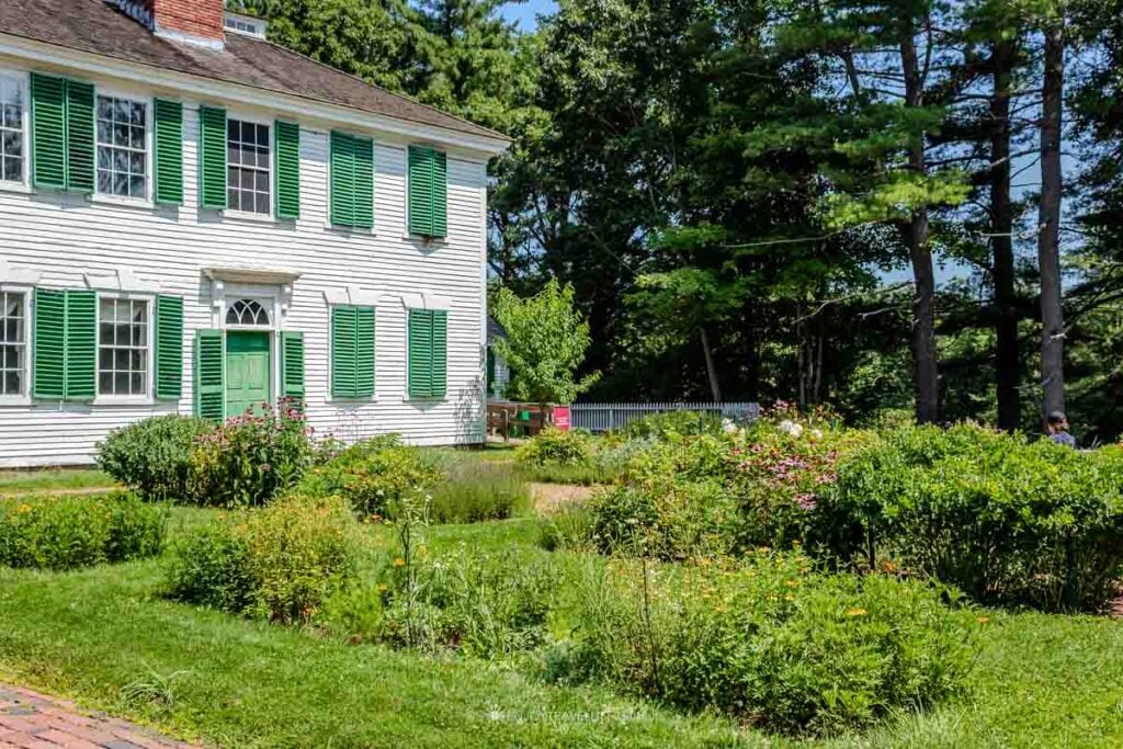 Summer flower gardens bloom in front of the Salem Towne House.