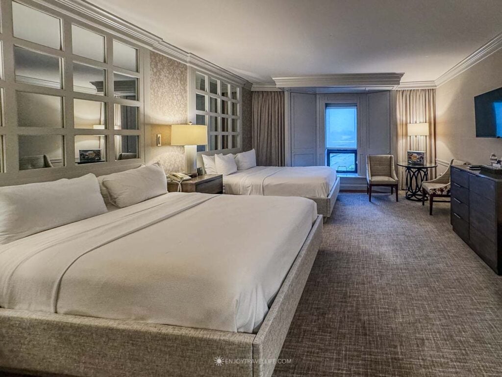 Guest room with a king bed at the Beechwood Hotel in Worcester.