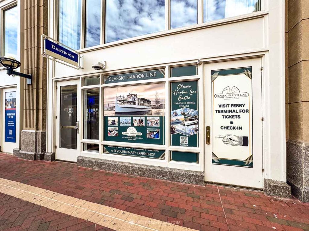 The Classic Harbor Line storefront at Rowes Wharf points passengers to the ferry terminal for tickets and check-in.