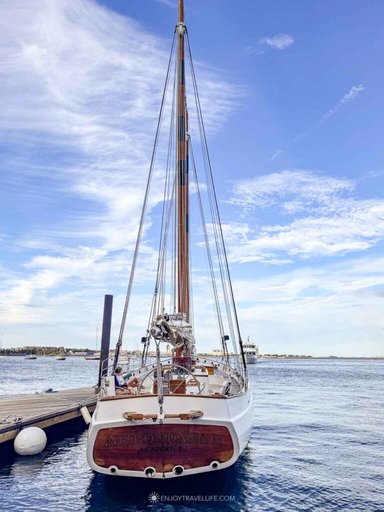 The schooner Adirondack III lies bow-on at the dock at Rowes Wharf in Boston before an evening departure.