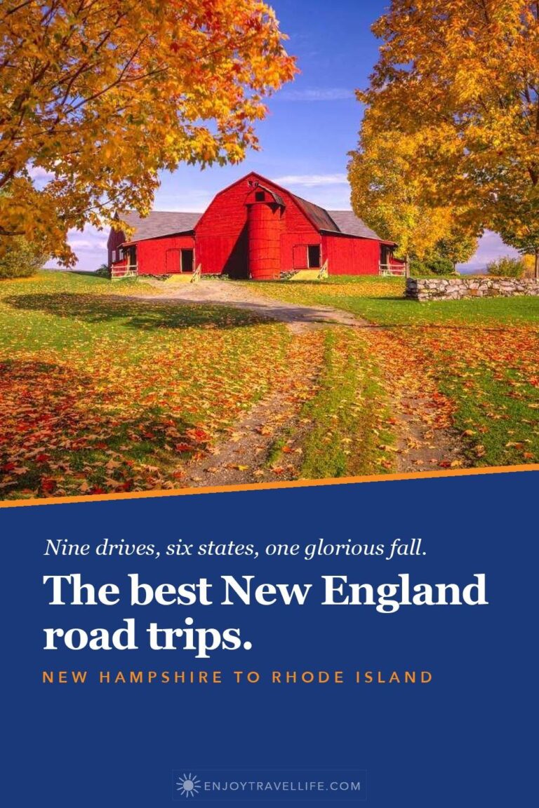A red barn under orange maples in Vermont.