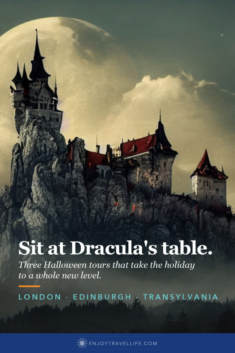 A gothic castle on a rocky crag under a full moon.