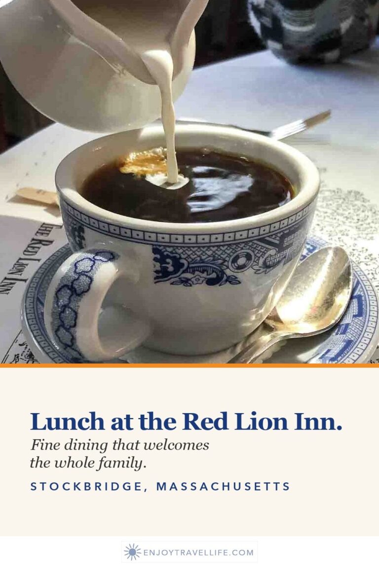 Cream being poured into a cup of coffee in blue-and-white china at the Red Lion Inn in Stockbridge, Massachusetts.