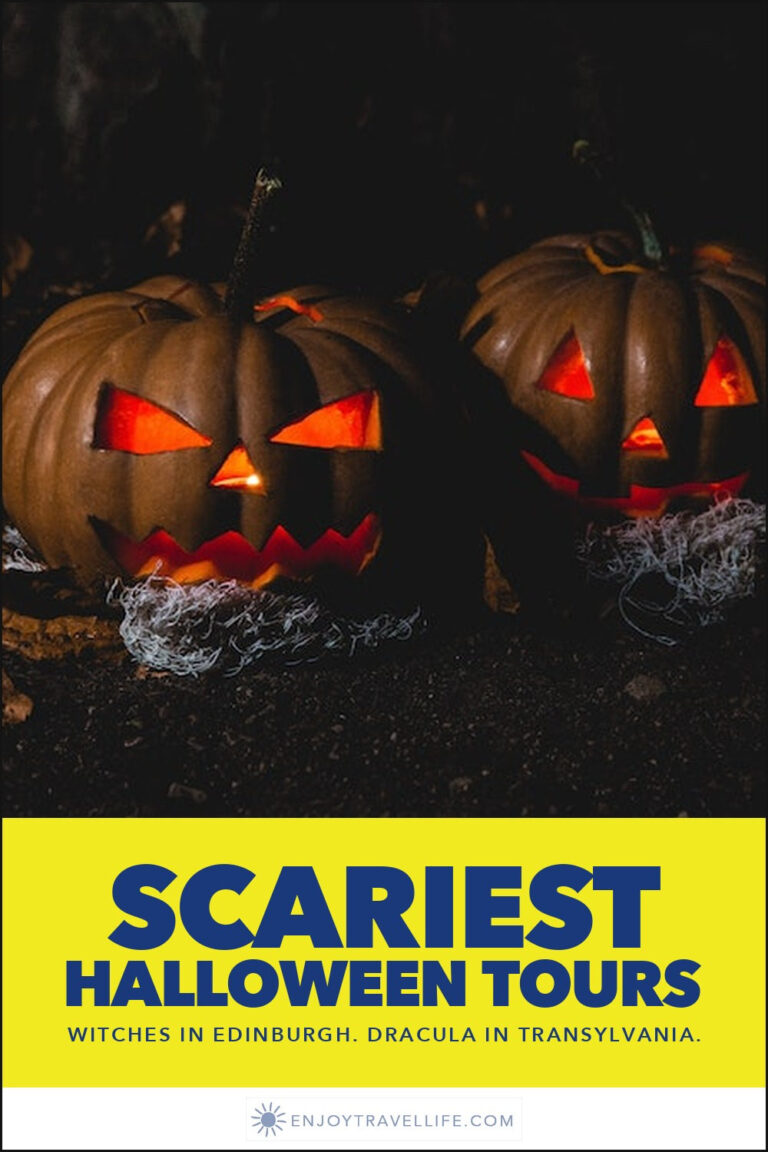 Two carved jack-o'-lanterns glow in the dark.