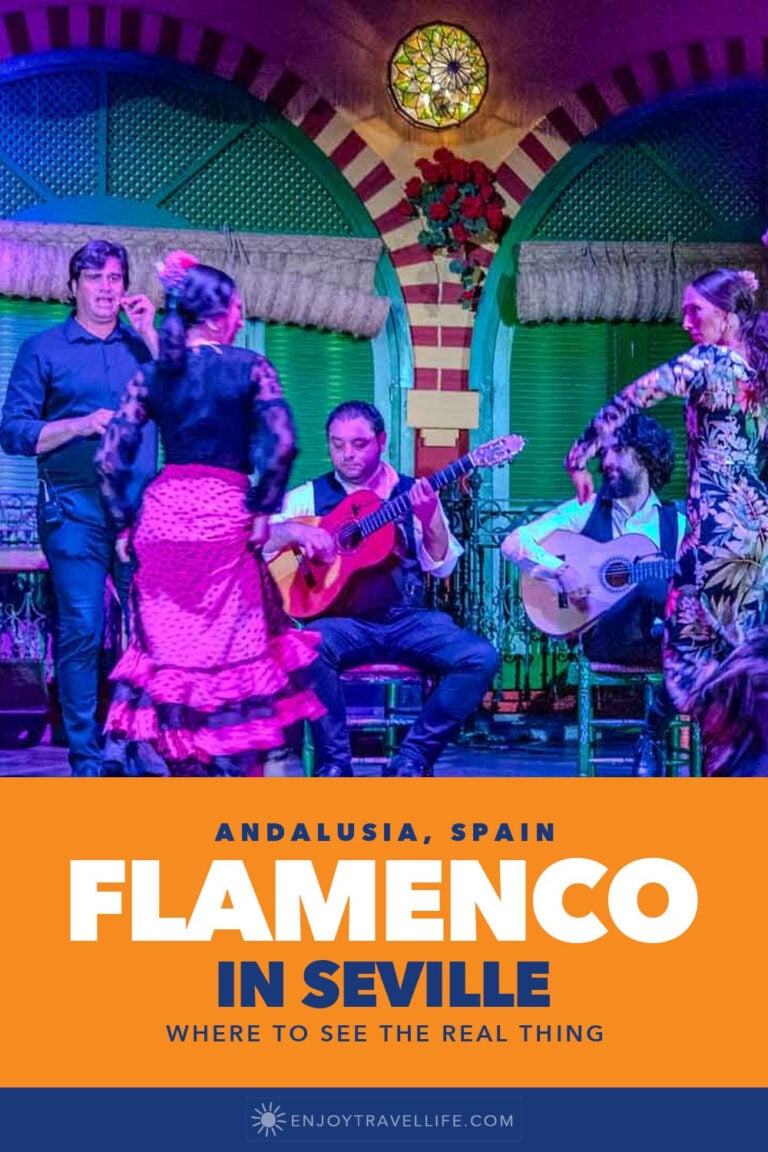 A flamenco dancer in a pink dress performs with guitarists and singers in Seville, Spain.