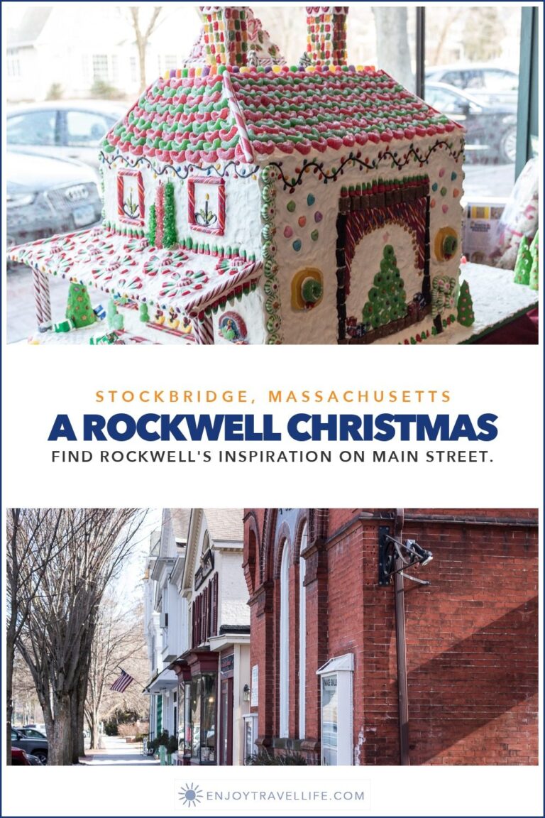 A gingerbread house in a shop window and the brick storefronts of Main Street in Stockbridge, Massachusetts.