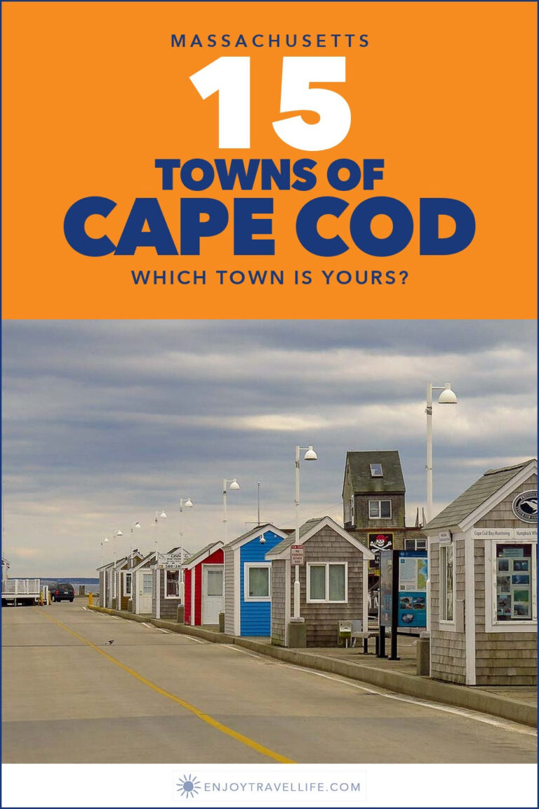 Gray-shingled cottages line a road at the dock in Provincetown, Cape Cod.