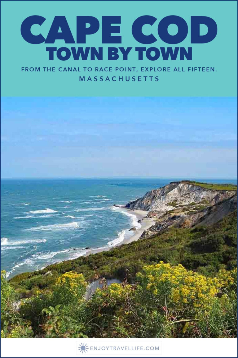 The clay cliffs of Aquinnah on Martha's Vineyard above a blue sea.
