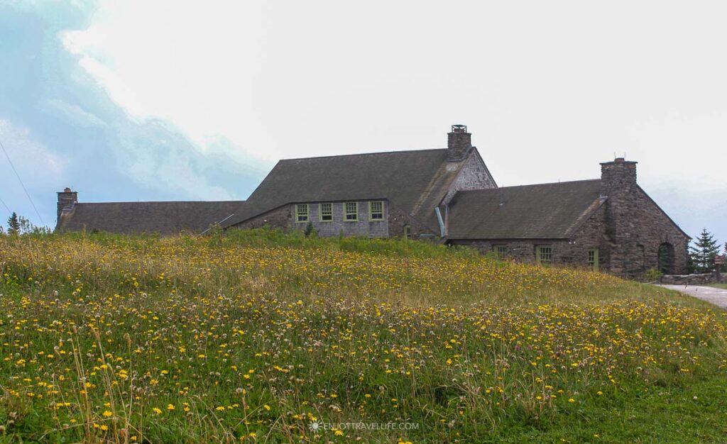 Bascom Lodge, a stone-and-timber lodge, sits in the summit meadow on Mount Greylock.