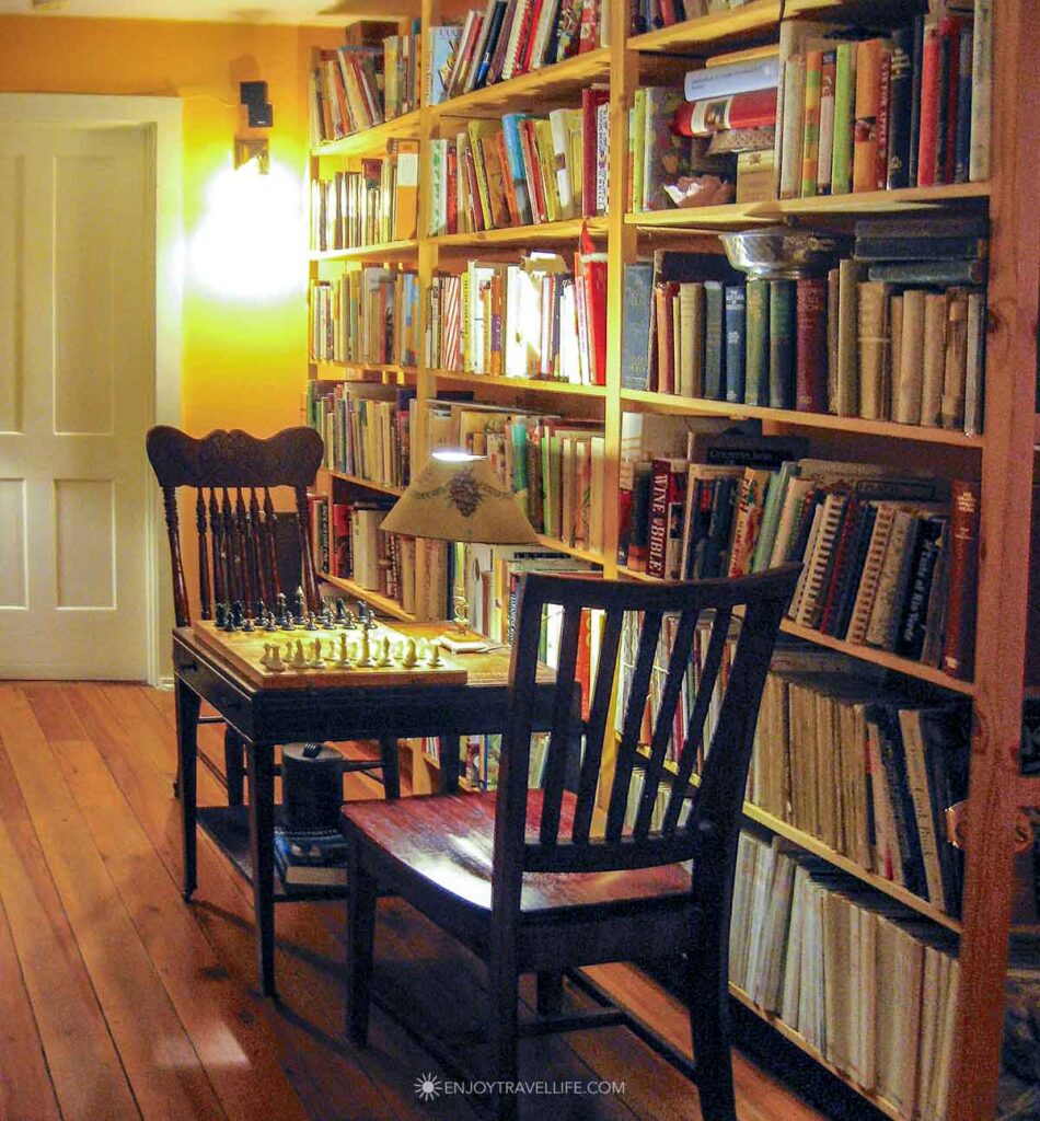 The book-lined library at the Inn at Sweet Water Farm in Great Barrington.