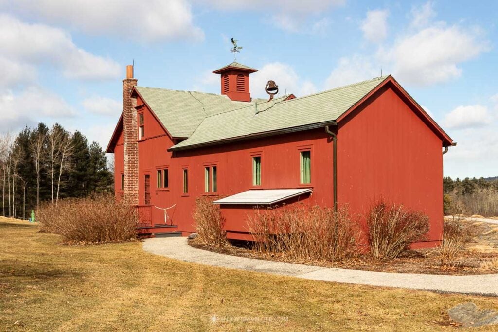 Norman Rockwell's red studio building stands at the end of a path on the museum grounds in Stockbridge.