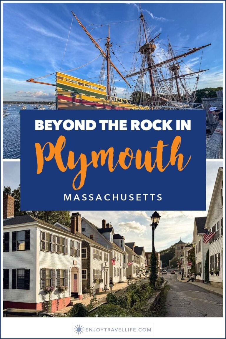 The Mayflower II replica at State Pier above a historic street of colonial houses in Plymouth, Massachusetts.